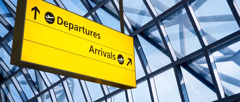 Banner image of airport signage
